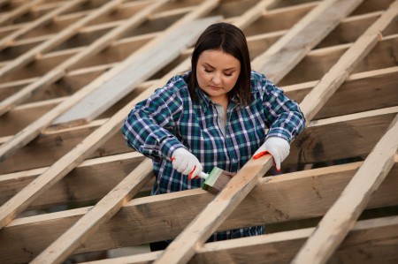 full-length-woman-working-wooden-plank.jpg