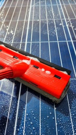 cleaning-dirty-solar-panels-maintenance.jpg